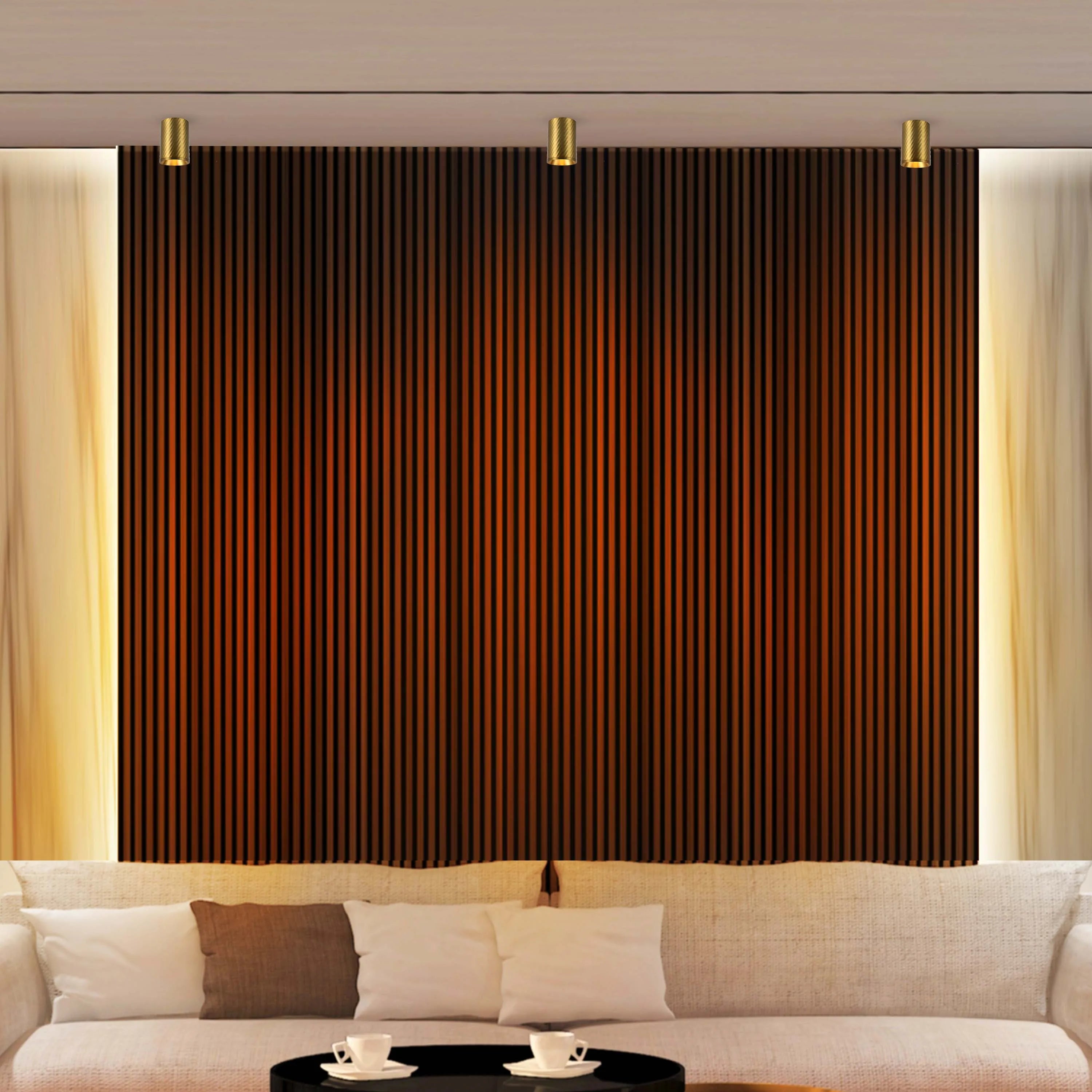 Ambient lighting with three gold, cylindrical downlights, flanking a decorative panel and soft, natural curtains.