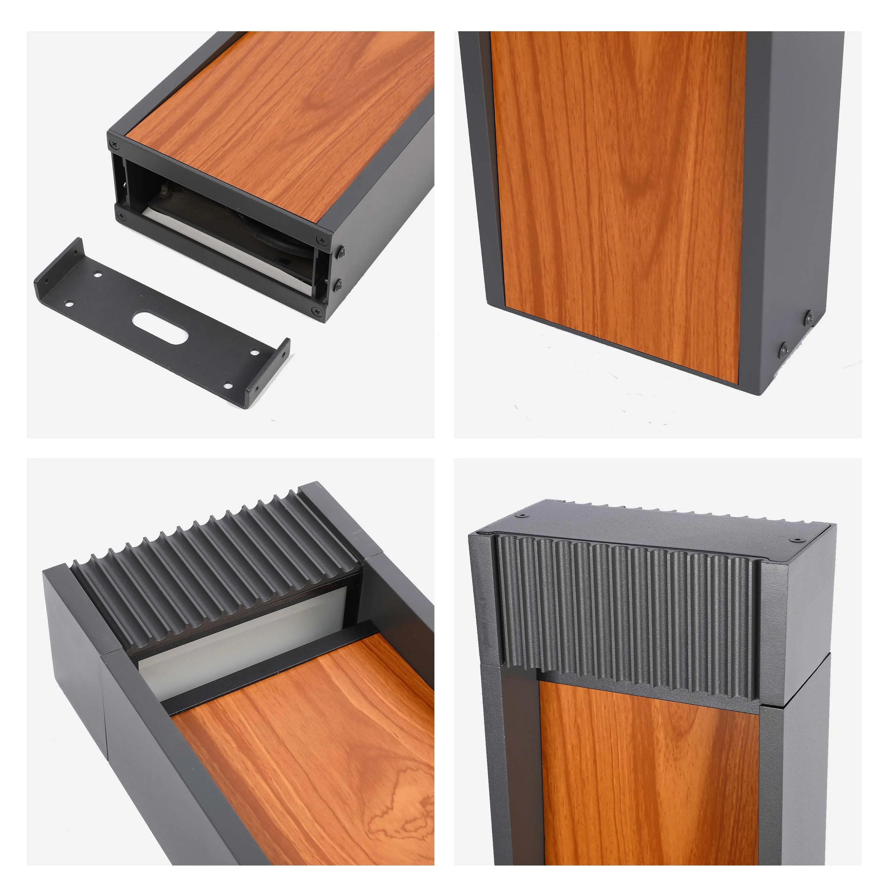 A modern outdoor light fixture is shown in detail, highlighting its wood-effect panelling and sleek, dark grey frame under bright lighting.
