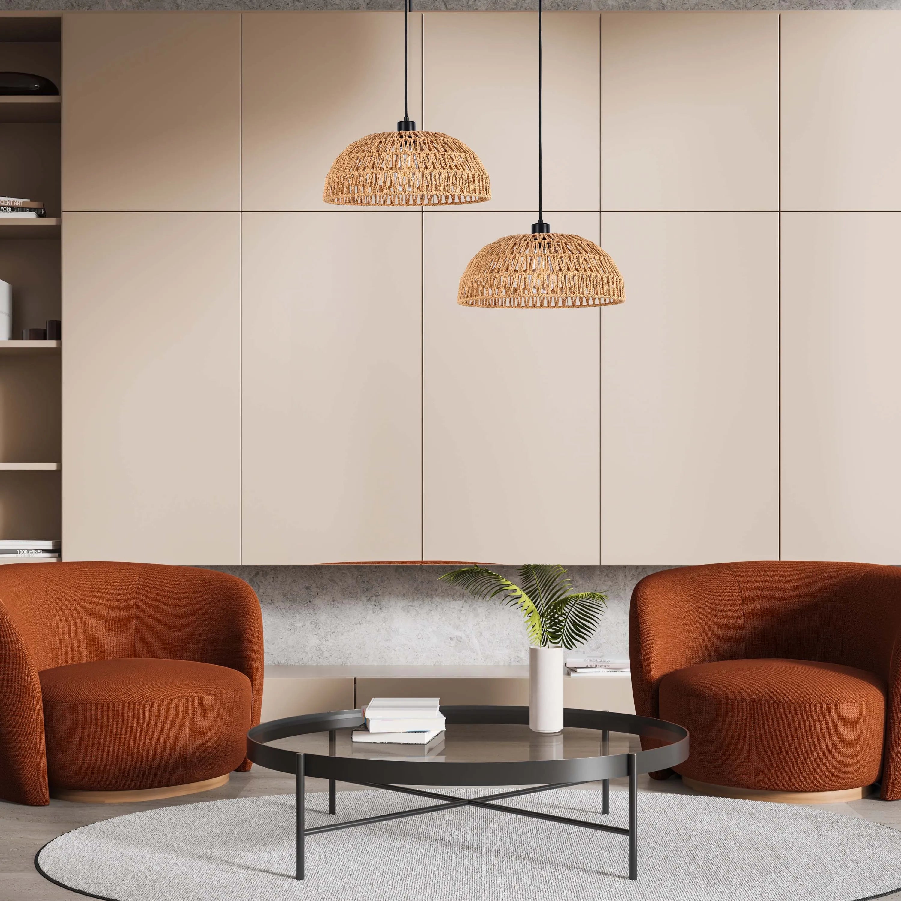 Two pendant lights with woven shades hang above a seating area. The warm tones create a cosy atmosphere.