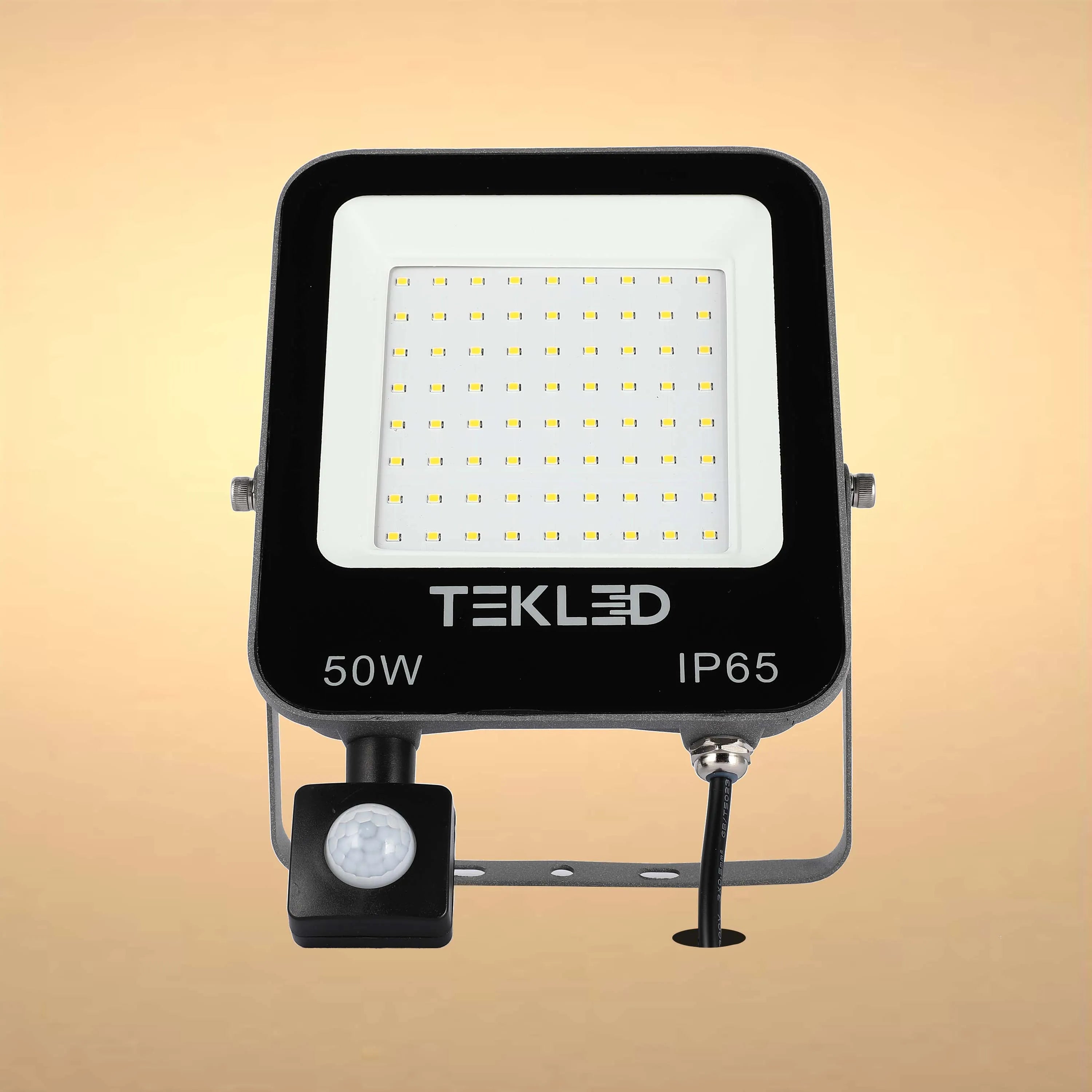TEKLED 50W IP65 rated LED flood light. Black casing, motion sensor and bright white light.