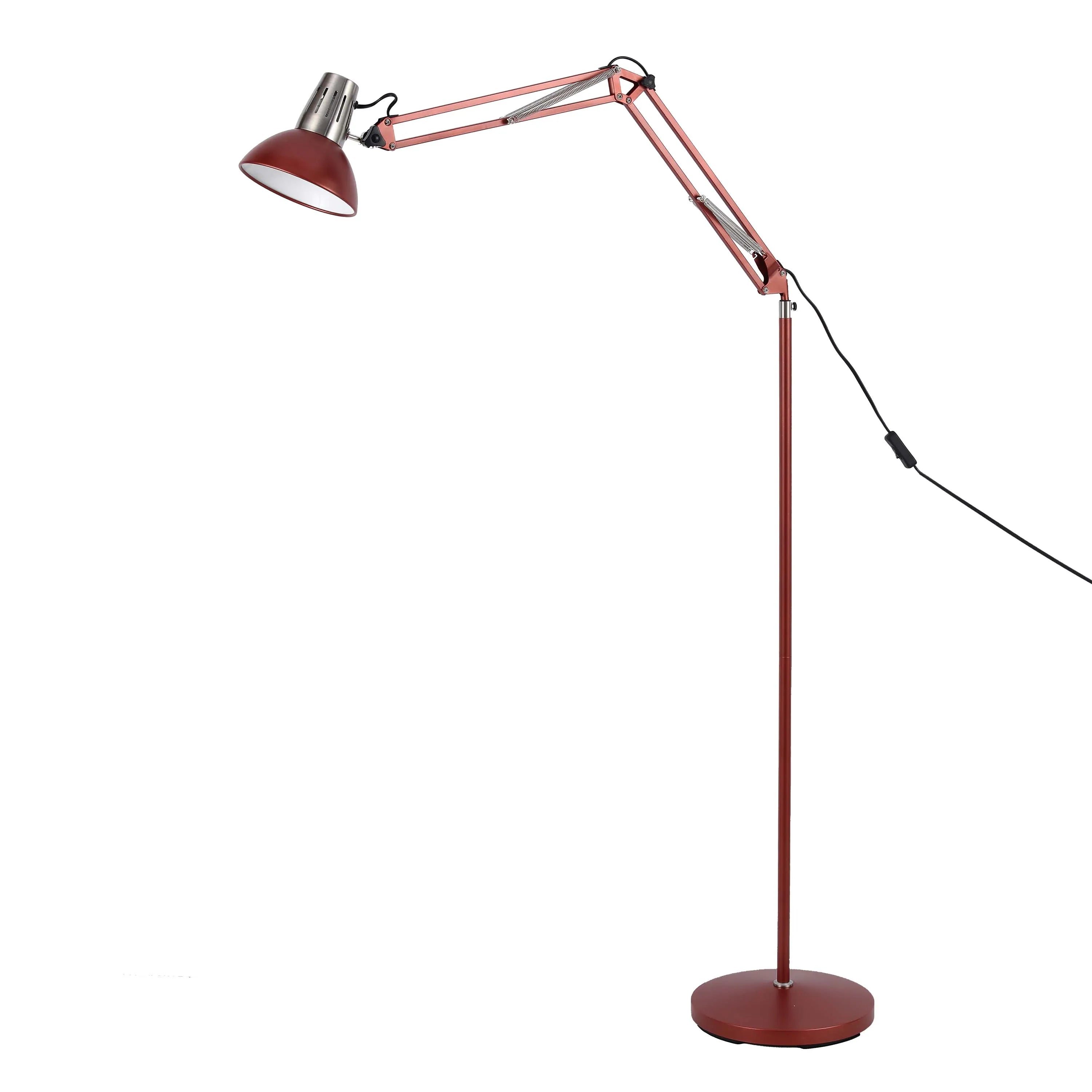 A red adjustable floor lamp with a silver shade is on display. Modern lighting for the contemporary home.