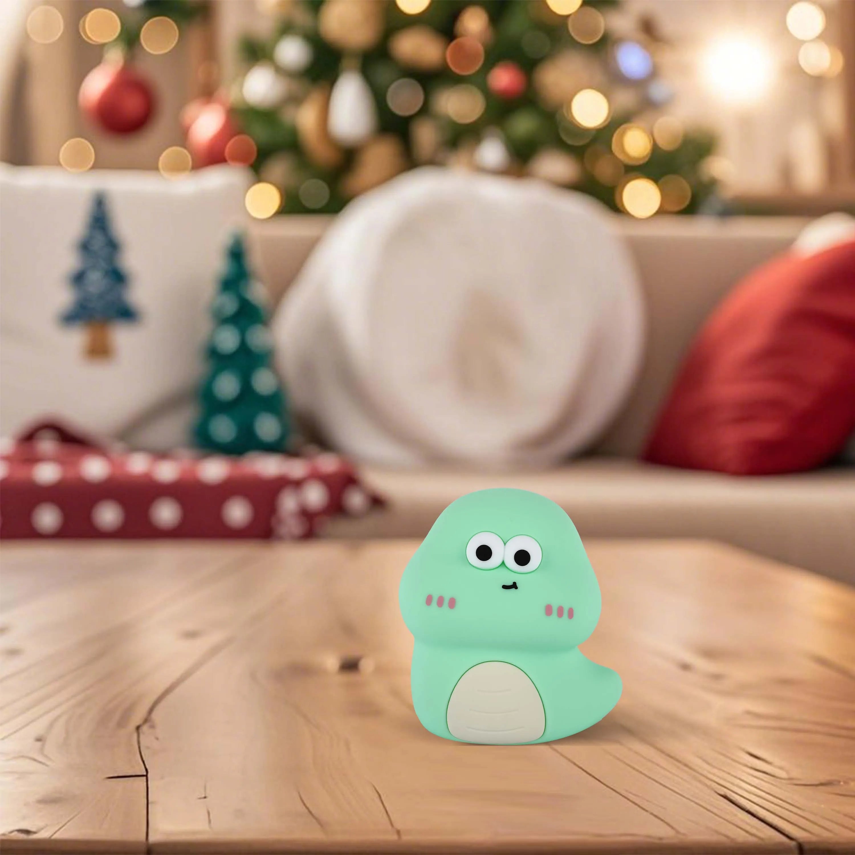 Warm, diffused lighting creates a cosy atmosphere, highlighting the charming dinosaur night light on a wooden surface.