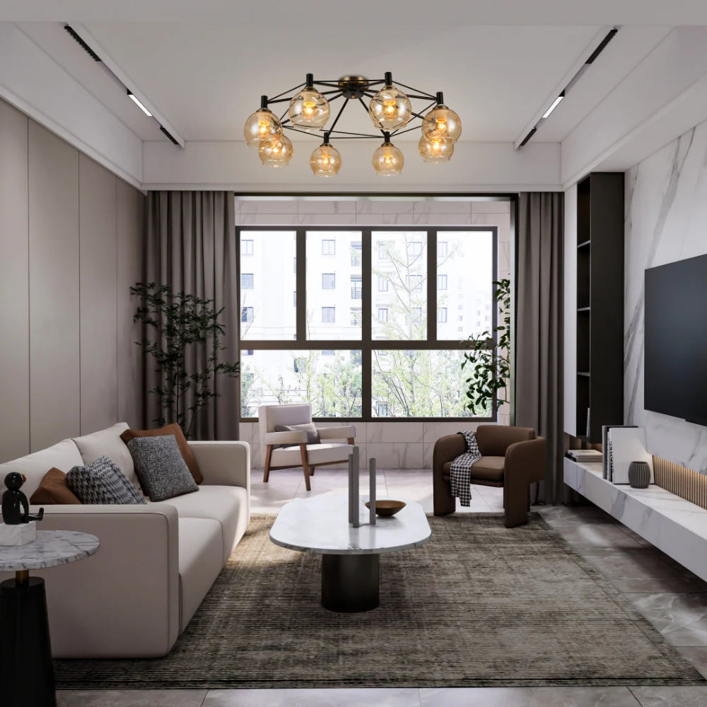 Modern living room lit by a statement black and gold flush mount chandelier with round, amber-tinted glass shades.