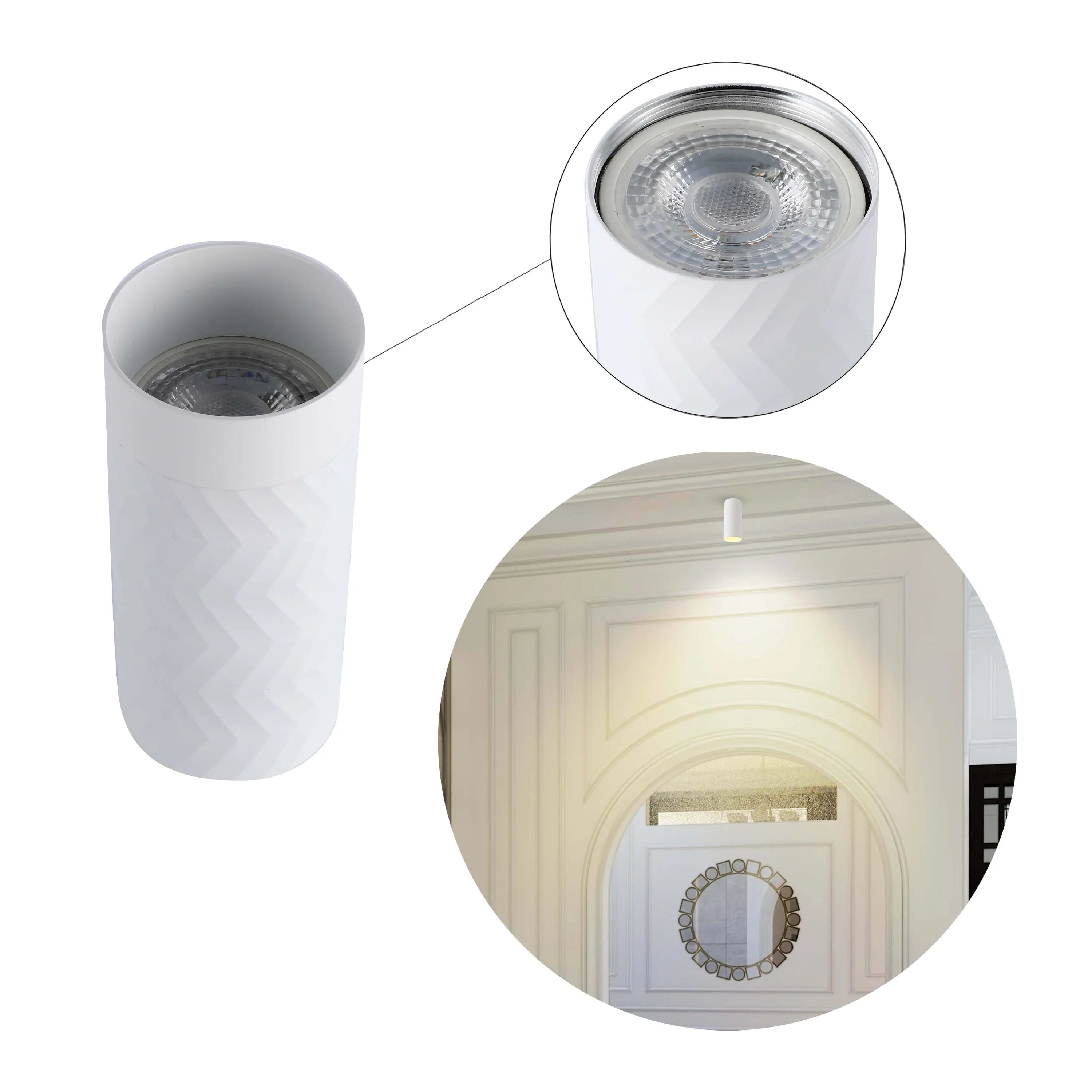 A cylindrical, white zig-zag textured downlight. Modern lighting with a minimalist aesthetic.