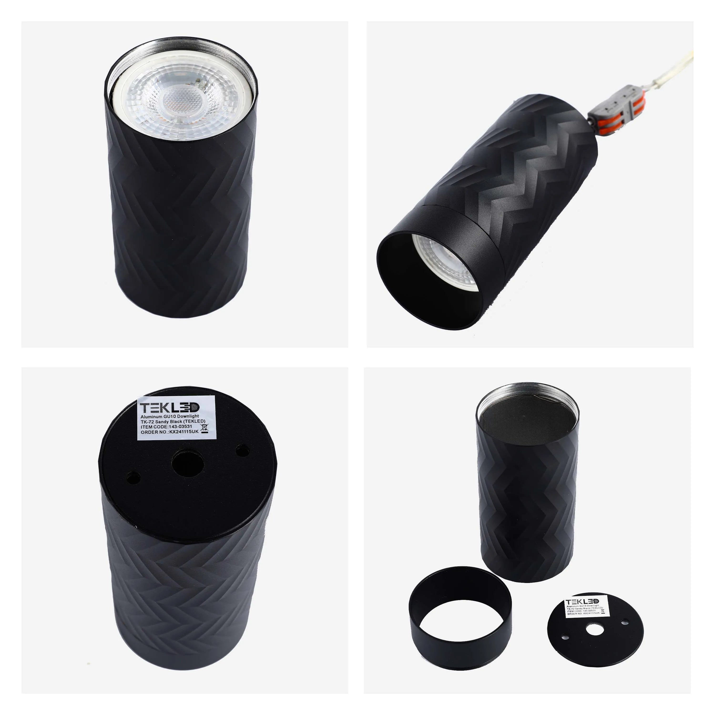 Modern black cylindrical spotlights, textured finish, ideal for a contemporary interior.