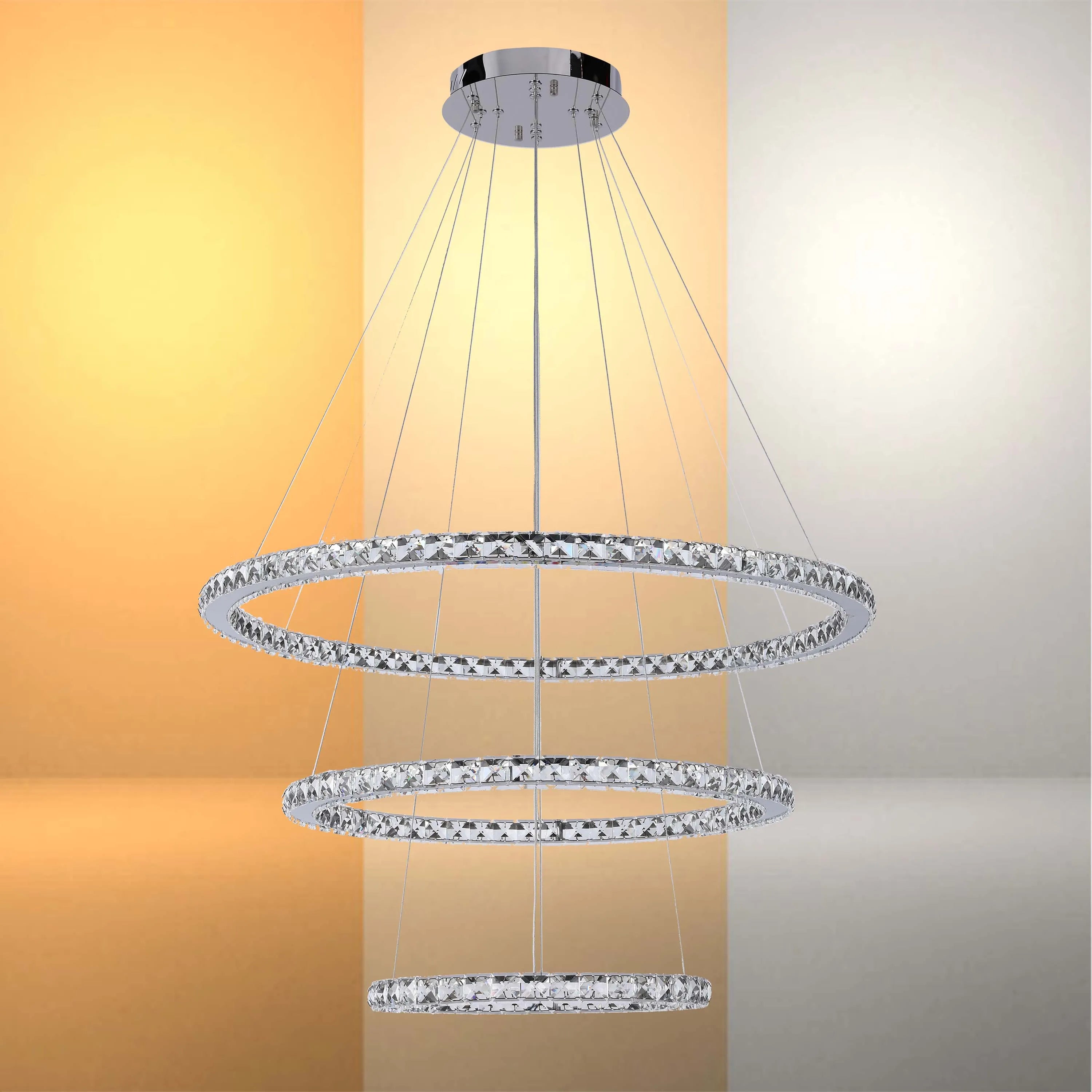 Chrome multi-tiered crystal halo pendant light. A contemporary eye-catching design that adds sparkle and luxury to any room.