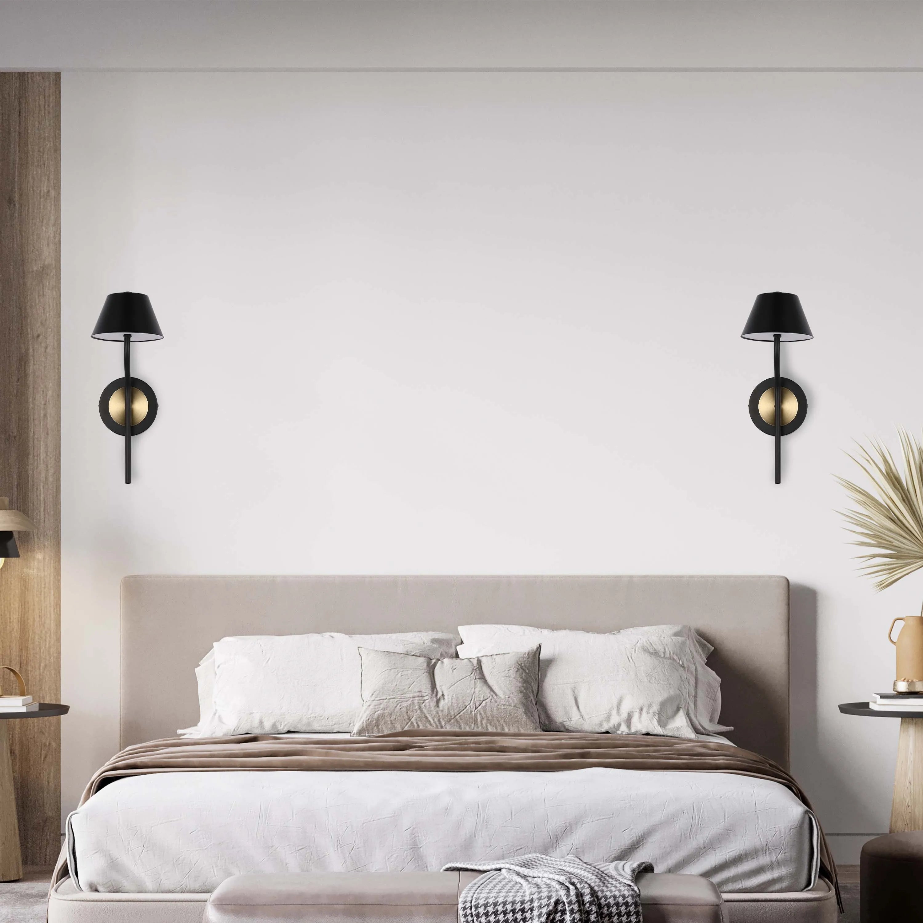 Stylish bedroom features two wall-mounted sconces with black shades and a golden central disc, casting warm ambient light.