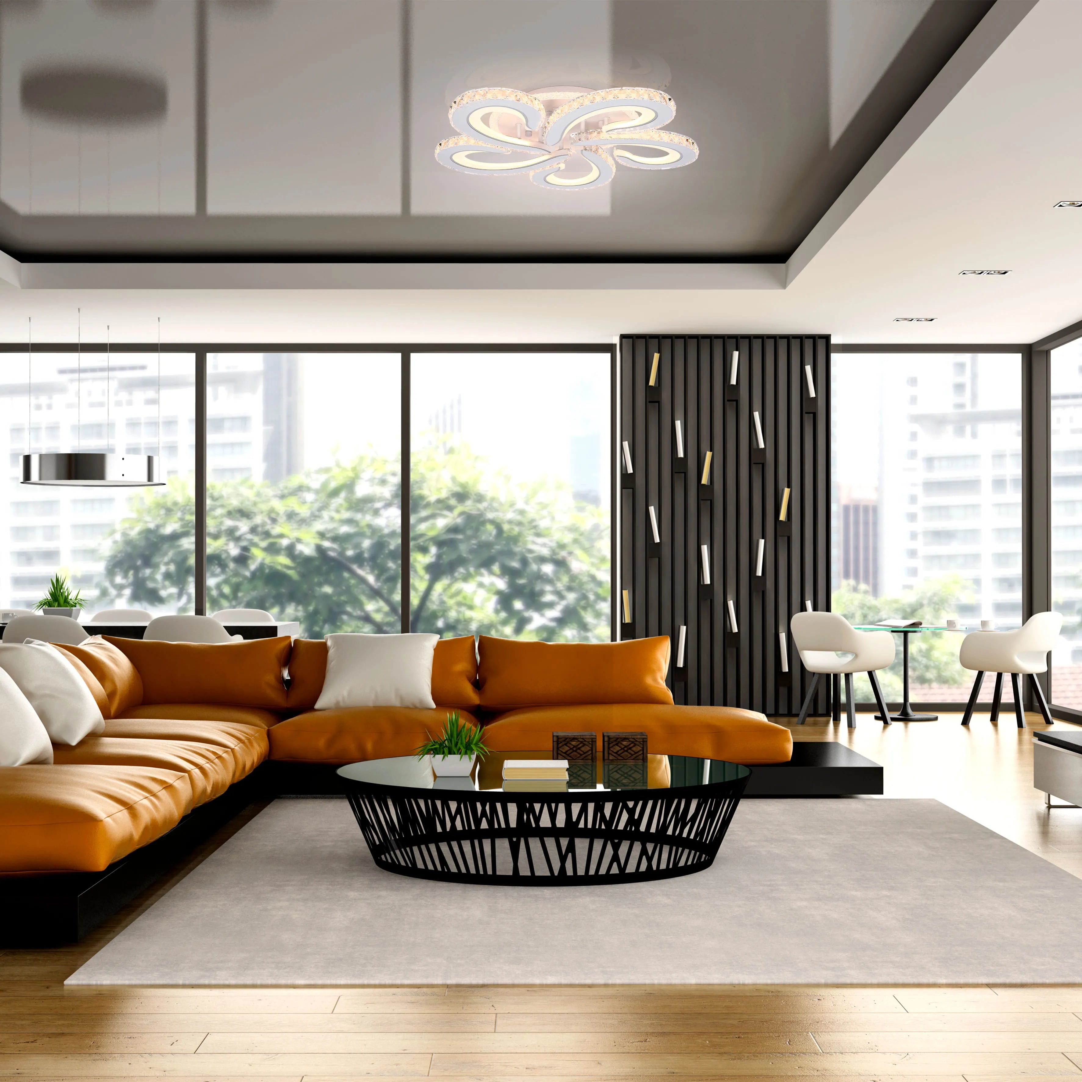 Statement lighting: A flower ceiling light, a ring chandelier, and recessed spots illuminate this contemporary lounge.