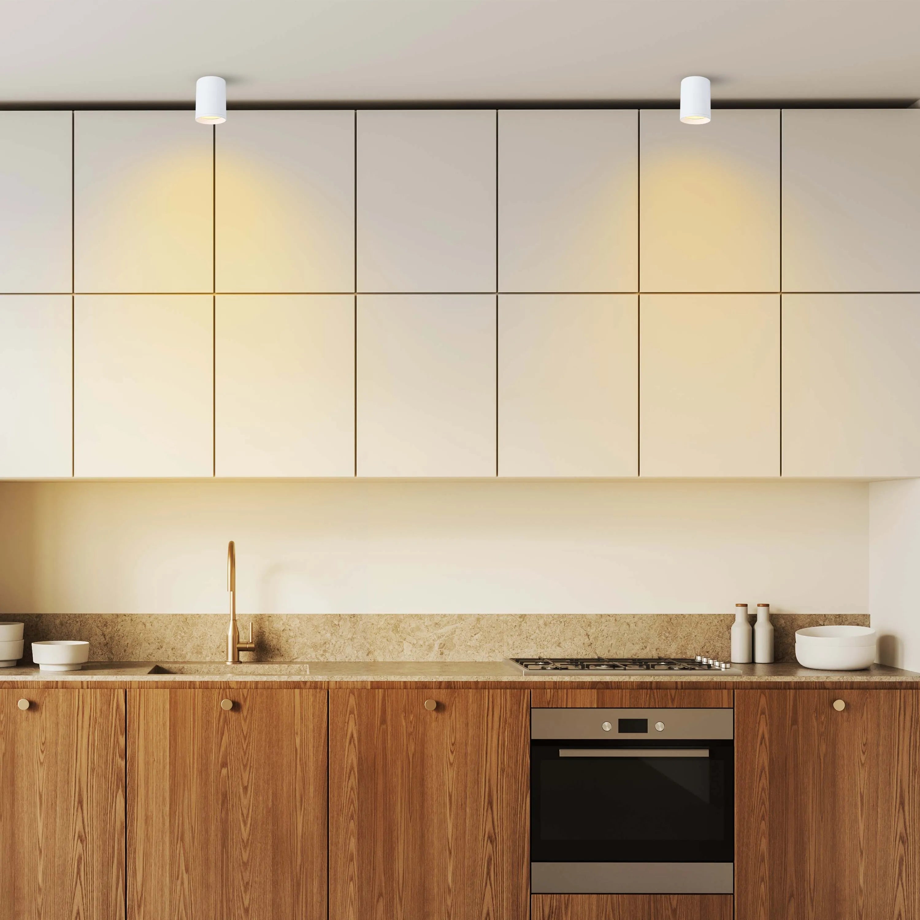 Contemporary kitchen lighting featuring spotlights. Modern and sleek design providing bright task lighting for cooking.