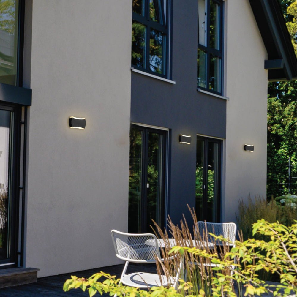 Outdoor usage of Black Quatro Arc Up Down Outdoor Modern LED Wall Light | TEKLED 182-03380