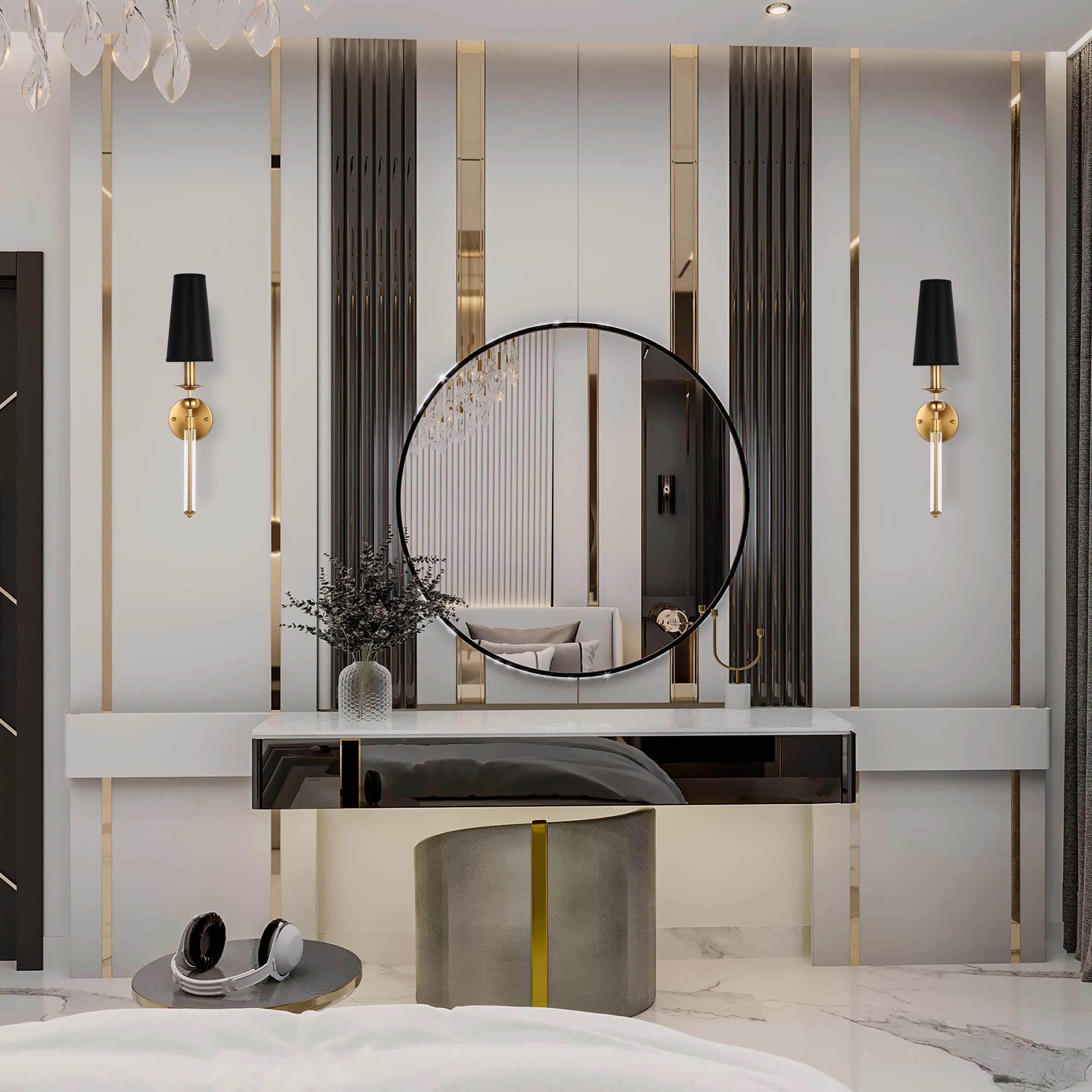 Modern bedroom featuring wall sconces with black shades and gold accents, alongside a glamorous chandelier reflecting in a round mirror.