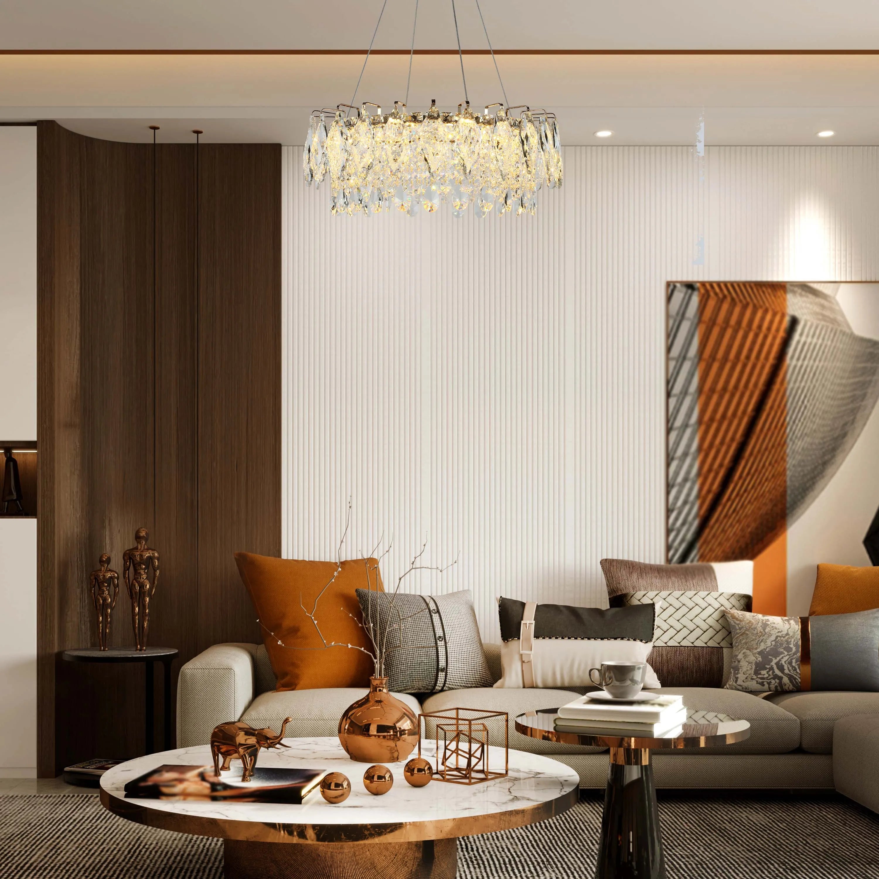 A crystal chandelier hangs above a modern living room, adding a touch of glamour with its sparkling accents.