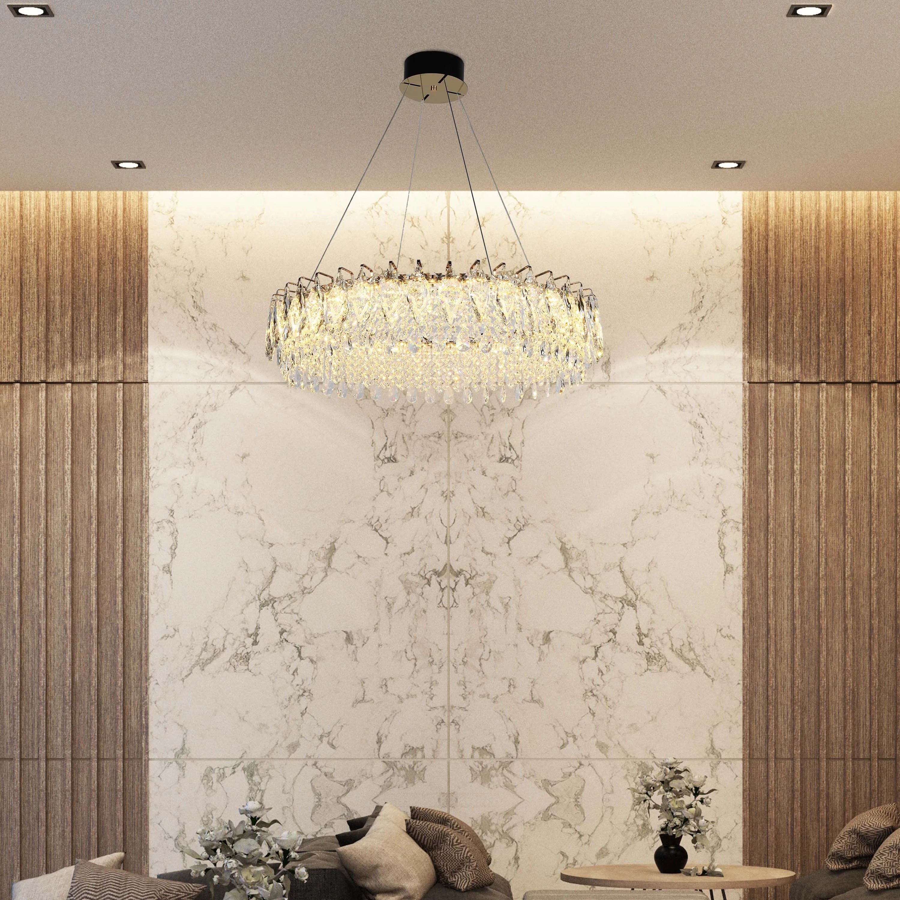 Contemporary lighting: A crystal chandelier illuminates the space, complemented by square recessed ceiling lights.