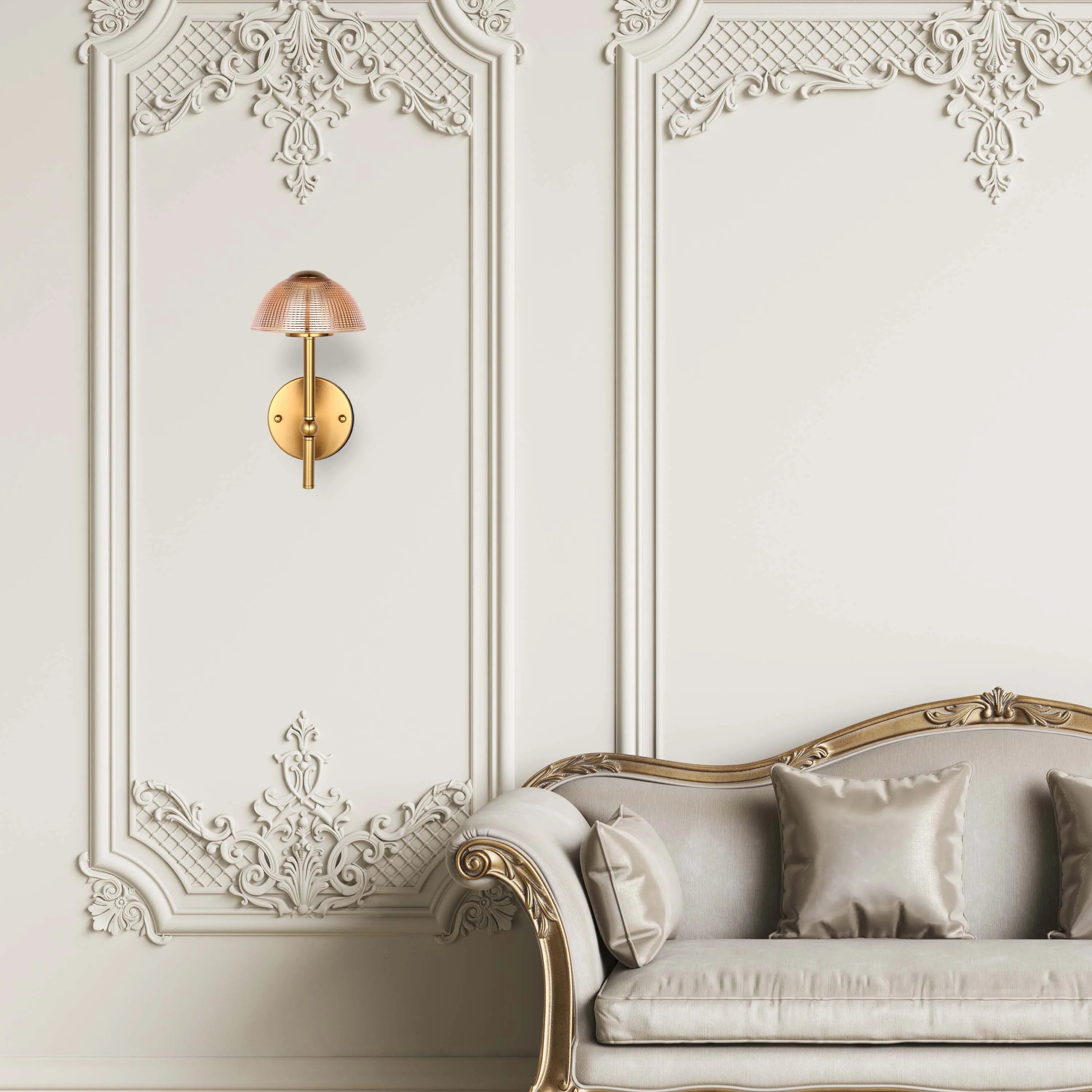 Elegant wall-mounted light fitting with a patterned glass shade and gold-coloured base, illuminating a luxurious interior setting.