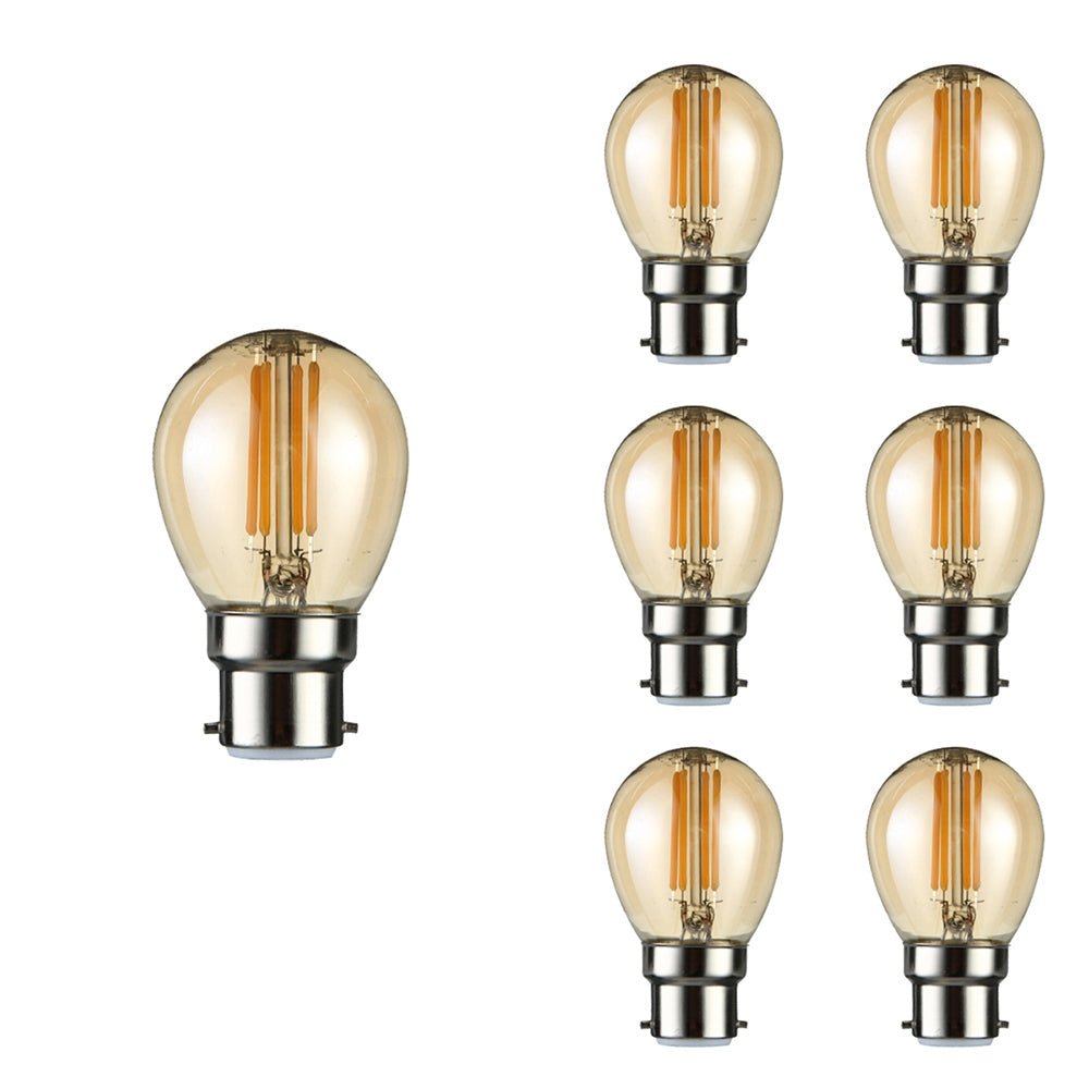 Close up of led filament bulb golf ball g45 b22 bayonet cap 4w 400lm warm white 2500k amber pack of 6