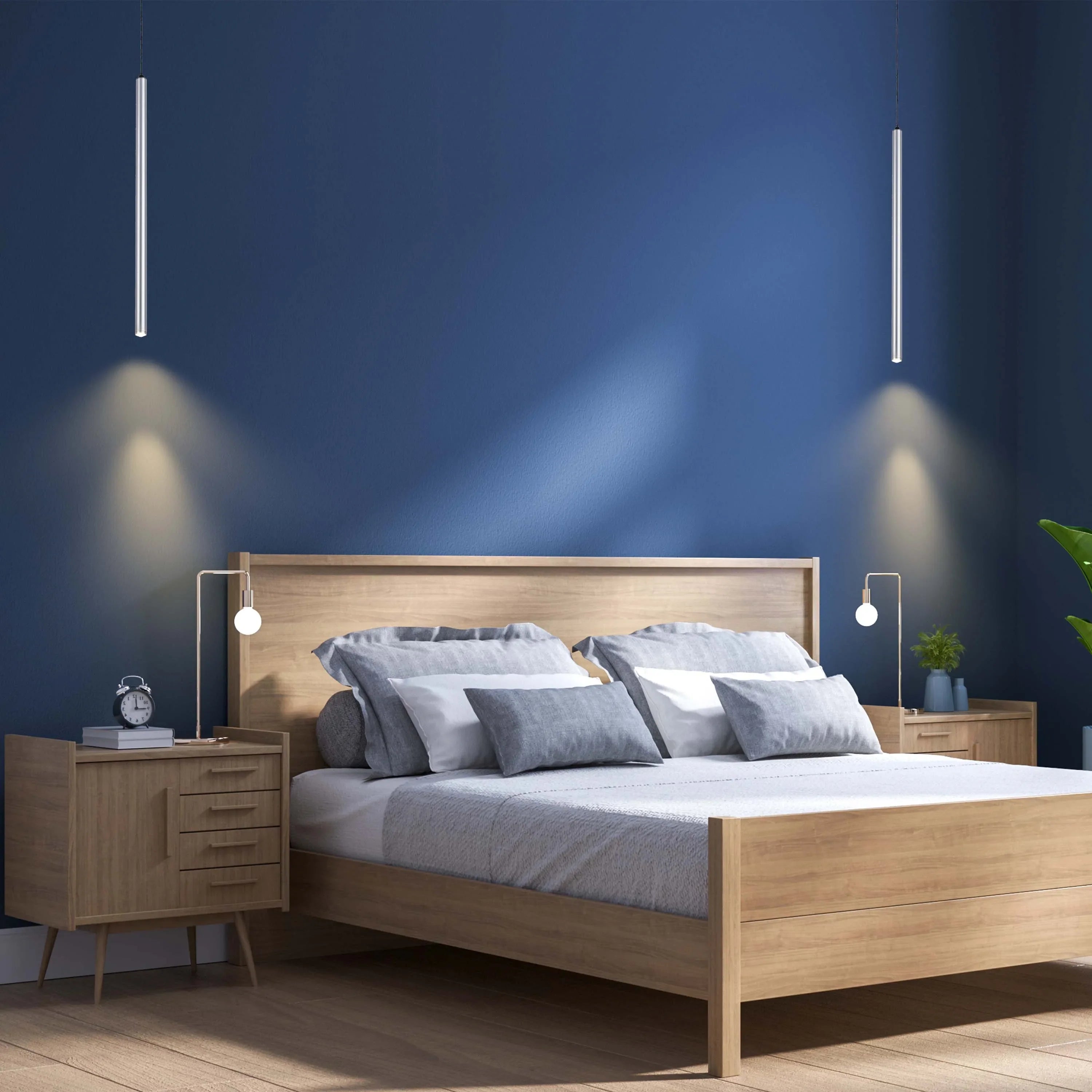 Contemporary bedroom lighting showcasing pendant and bedside lamps. Creates a warm and inviting ambiance with a soft glow.