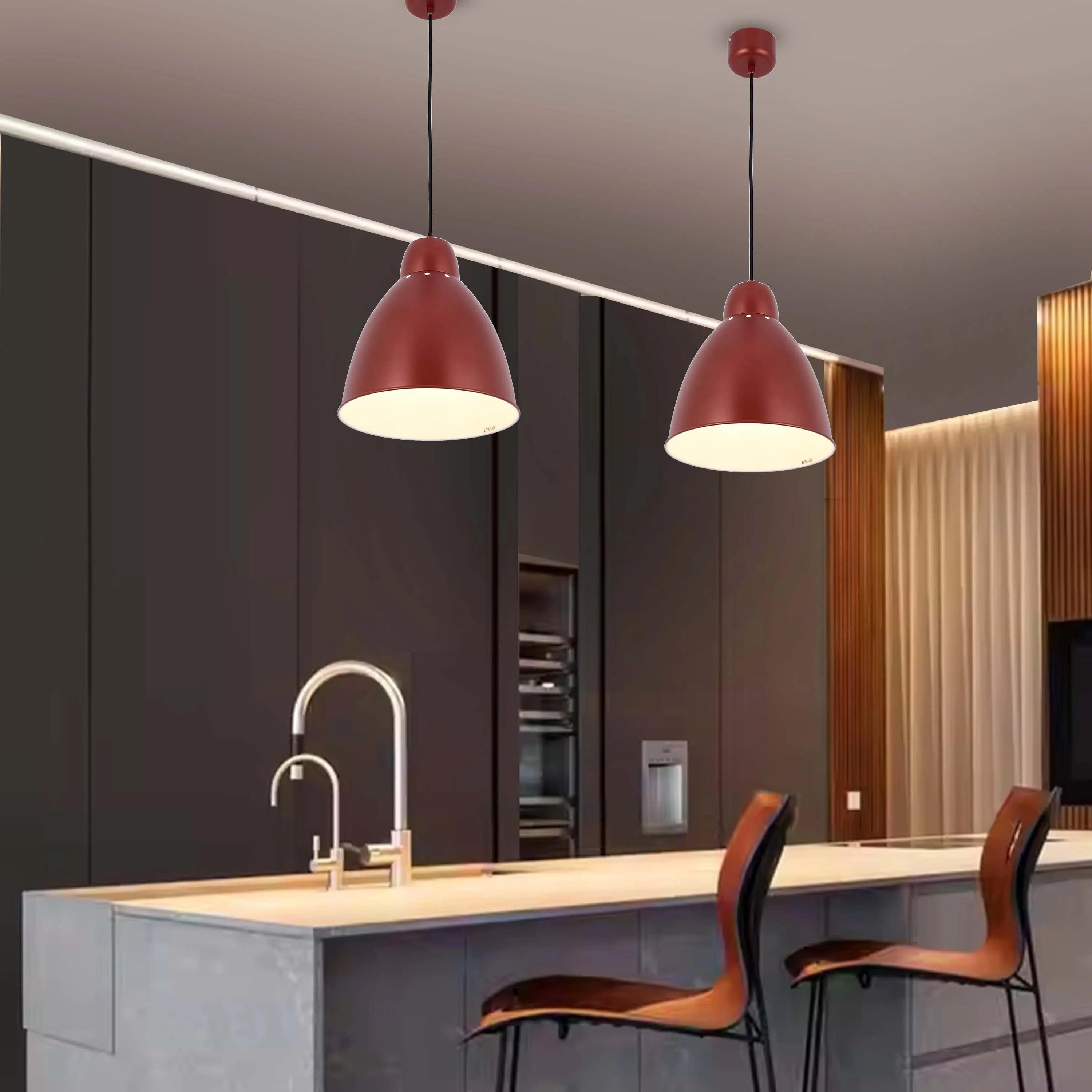 Stylish kitchen lighting with two red dome pendant lights, providing warm illumination over the kitchen island.
