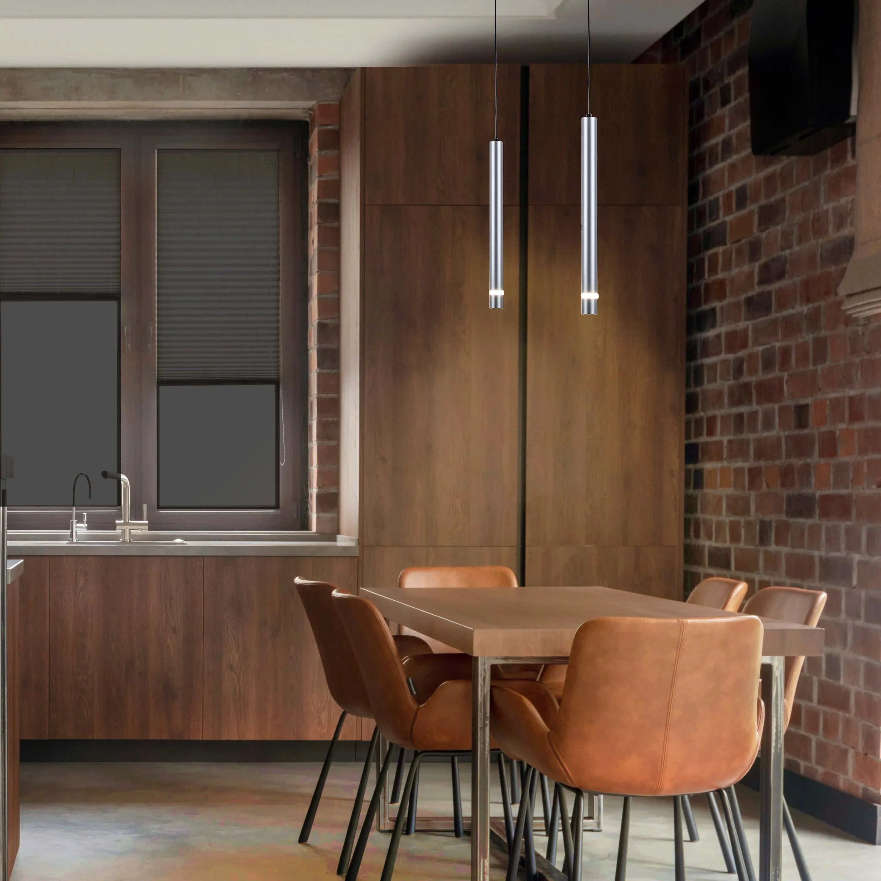 Contemporary kitchen lighting with two pendant lights hanging above a wooden table and leather chairs.