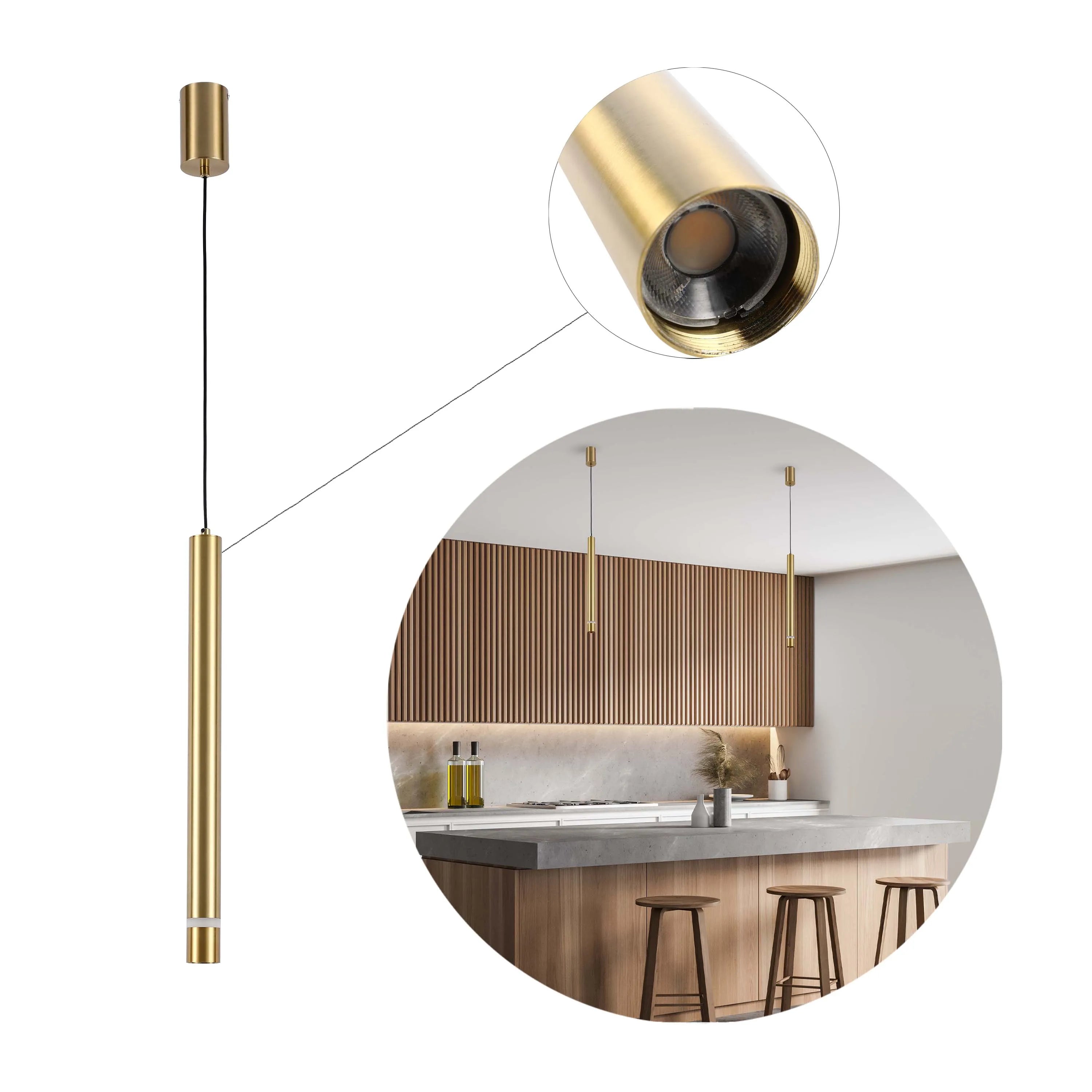 Gold cylindrical pendant lighting is featured in a modern kitchen setting, adding a sleek and contemporary touch.