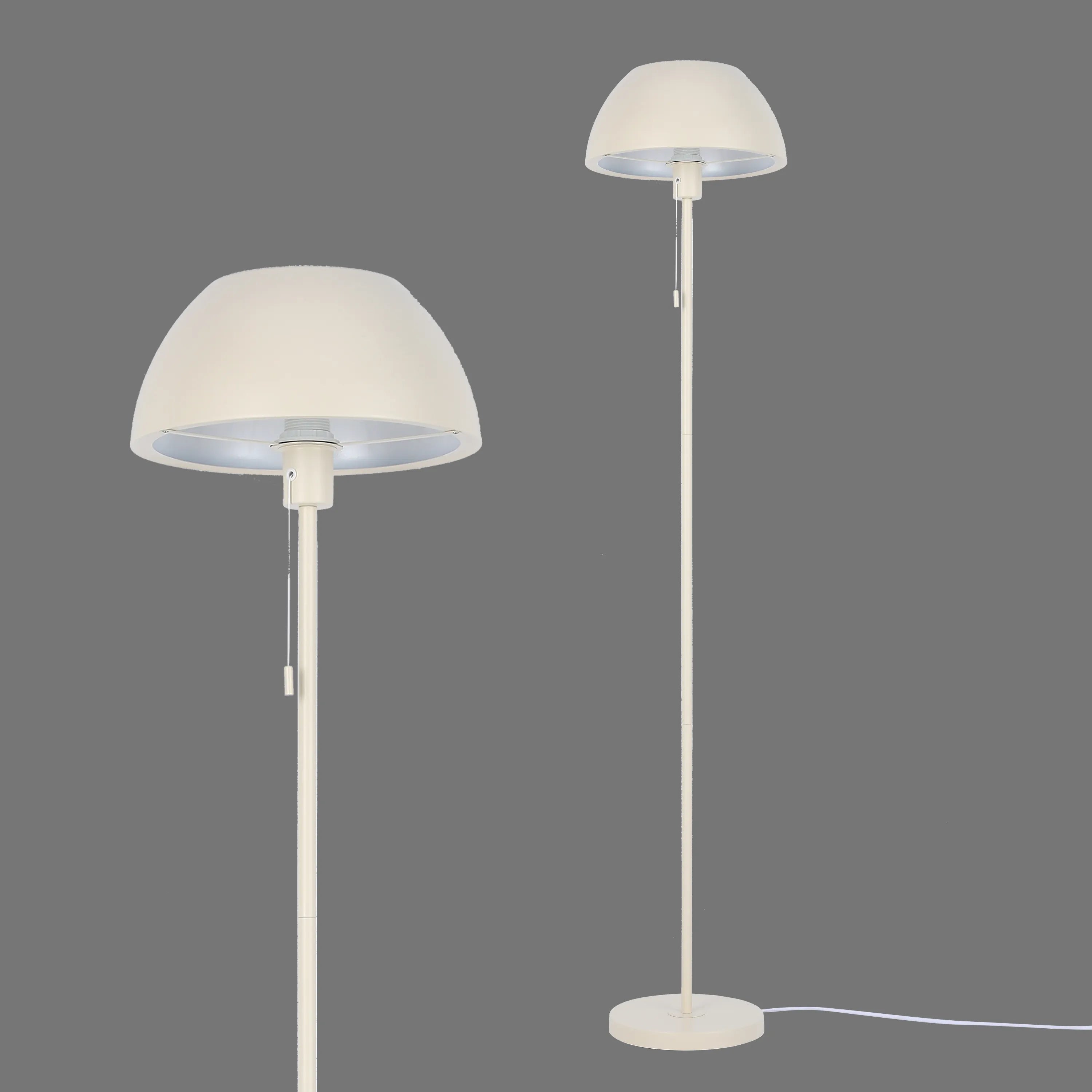 Two dome-shaped floor lamps, in neutral tones, illuminating the scene. The minimalist design is perfect for contemporary interiors.