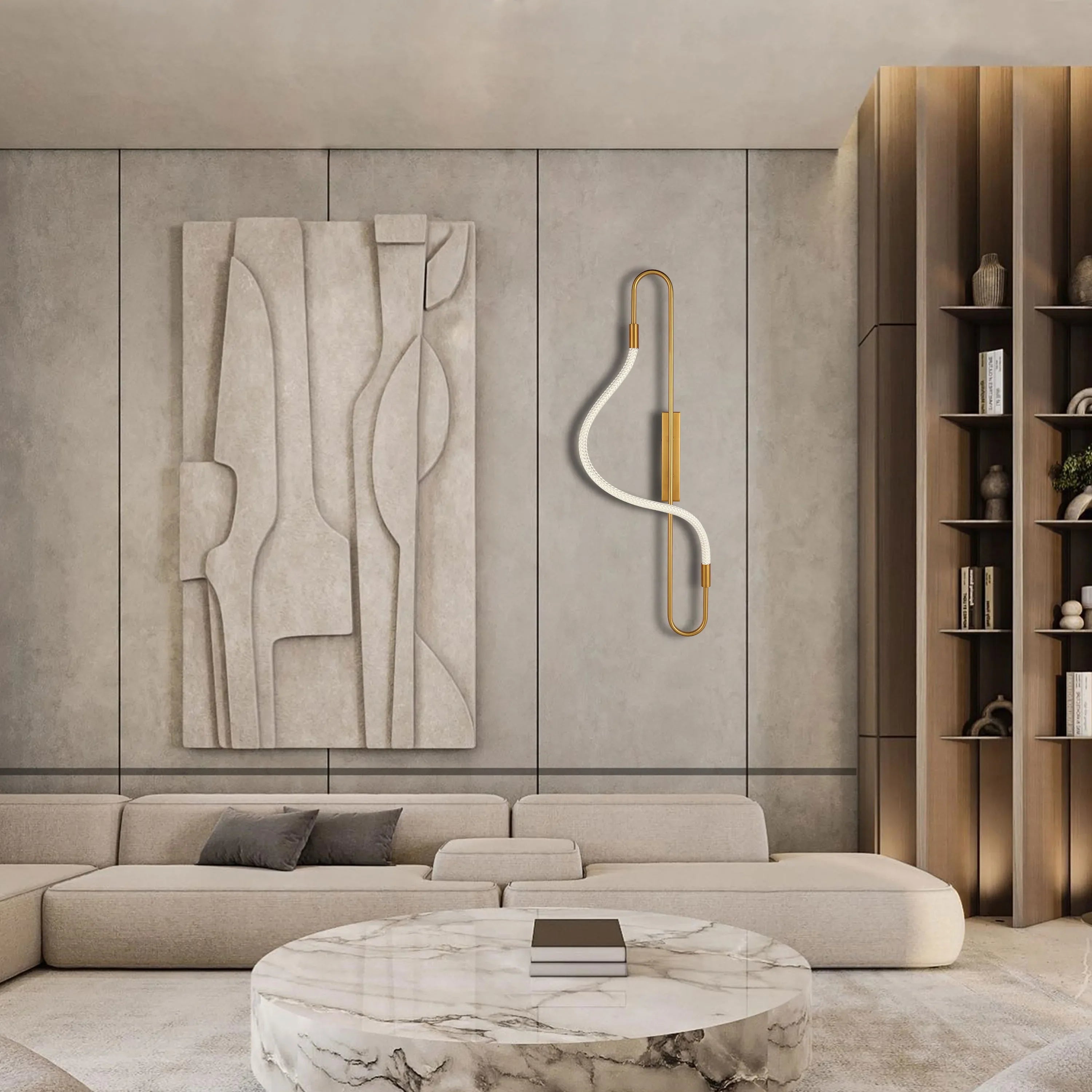 A sleek, modern wall light with gold metal accents and a curved, white LED strip creates a stylish and contemporary ambience.