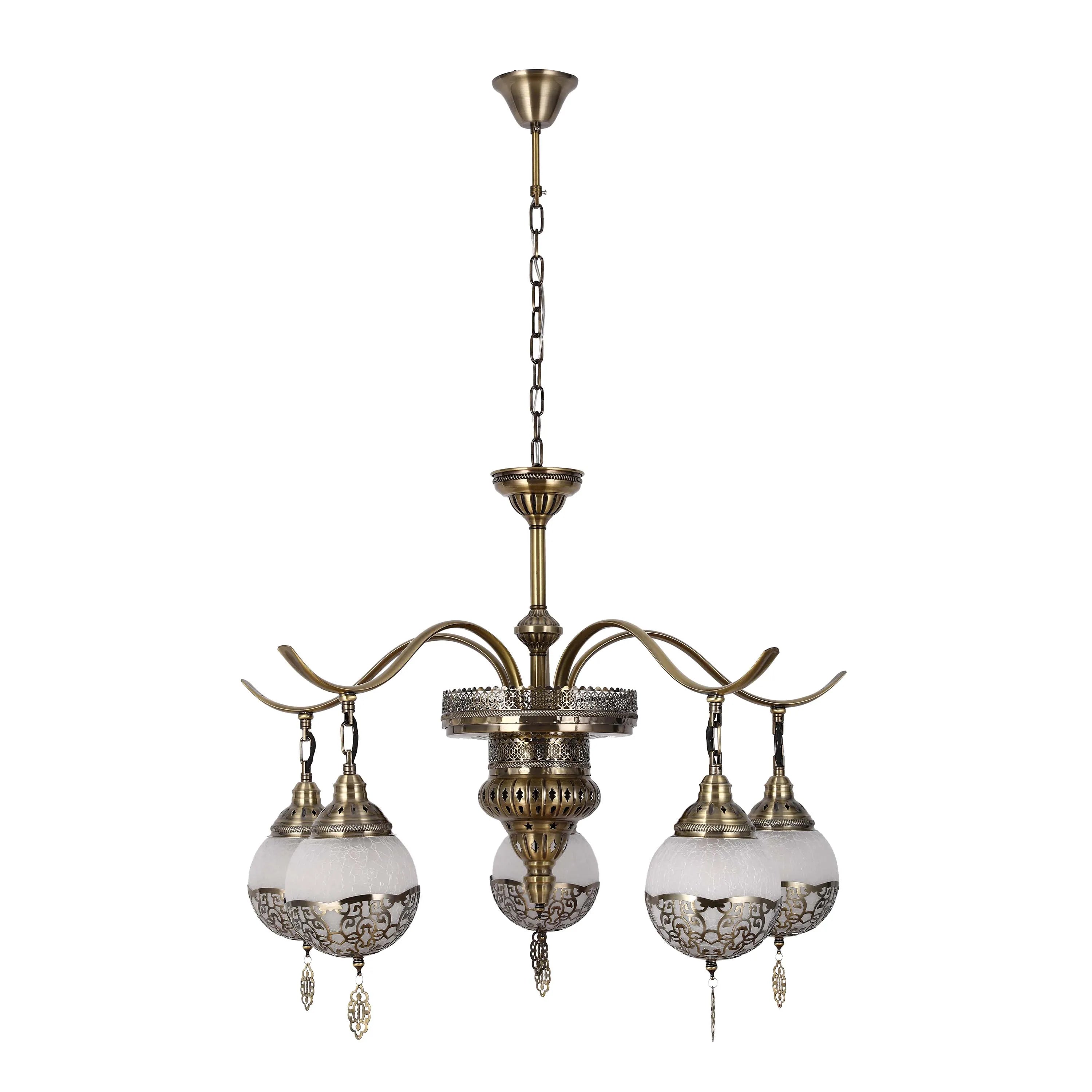 An ornate chandelier with bronze finishings and spherical glass shades.