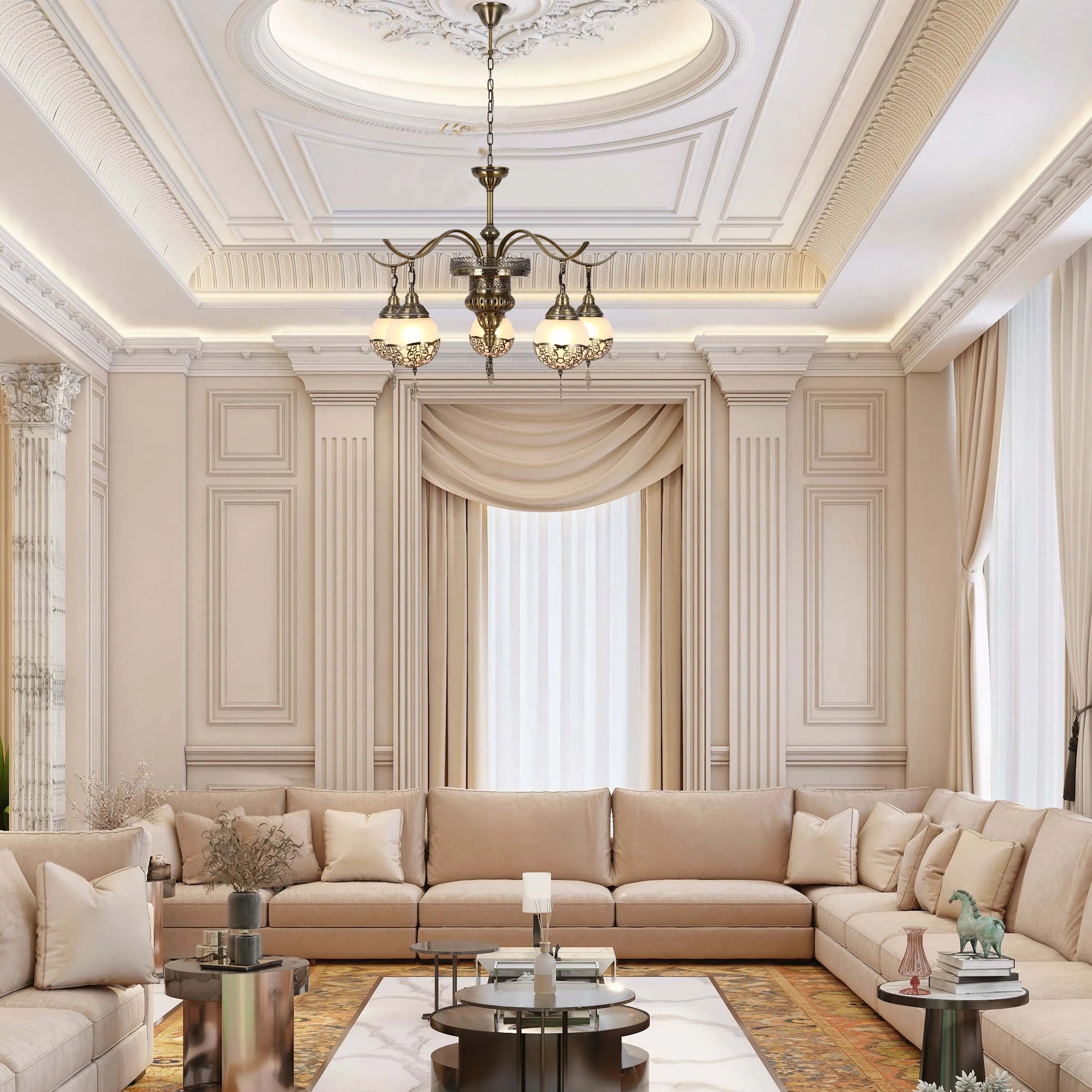 A stylish living room features a vintage style chandelier. Recessed lighting illuminates the ornate ceiling and walls.