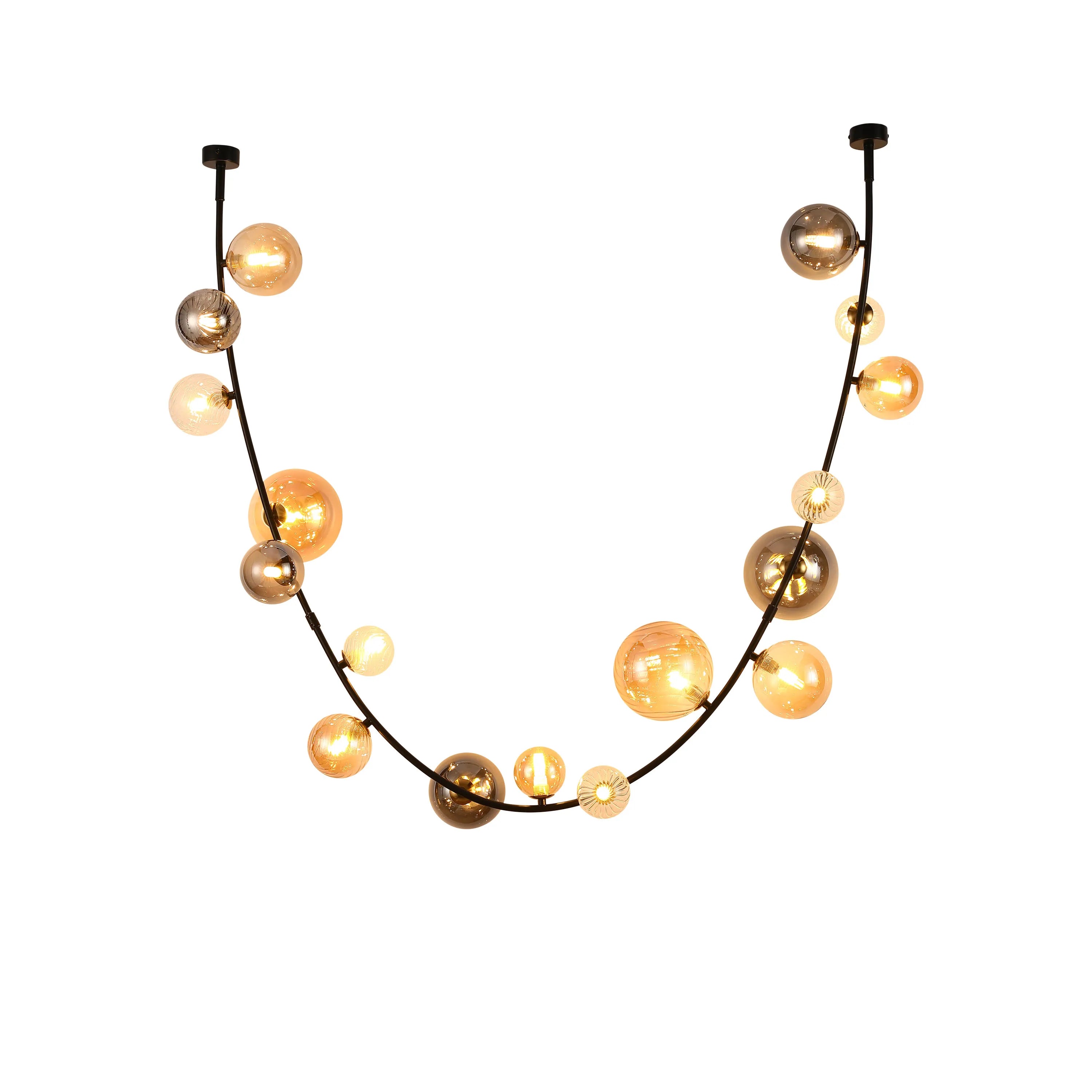 Modern chandelier with a black frame and amber and glass bulbs arranged in a curved line.