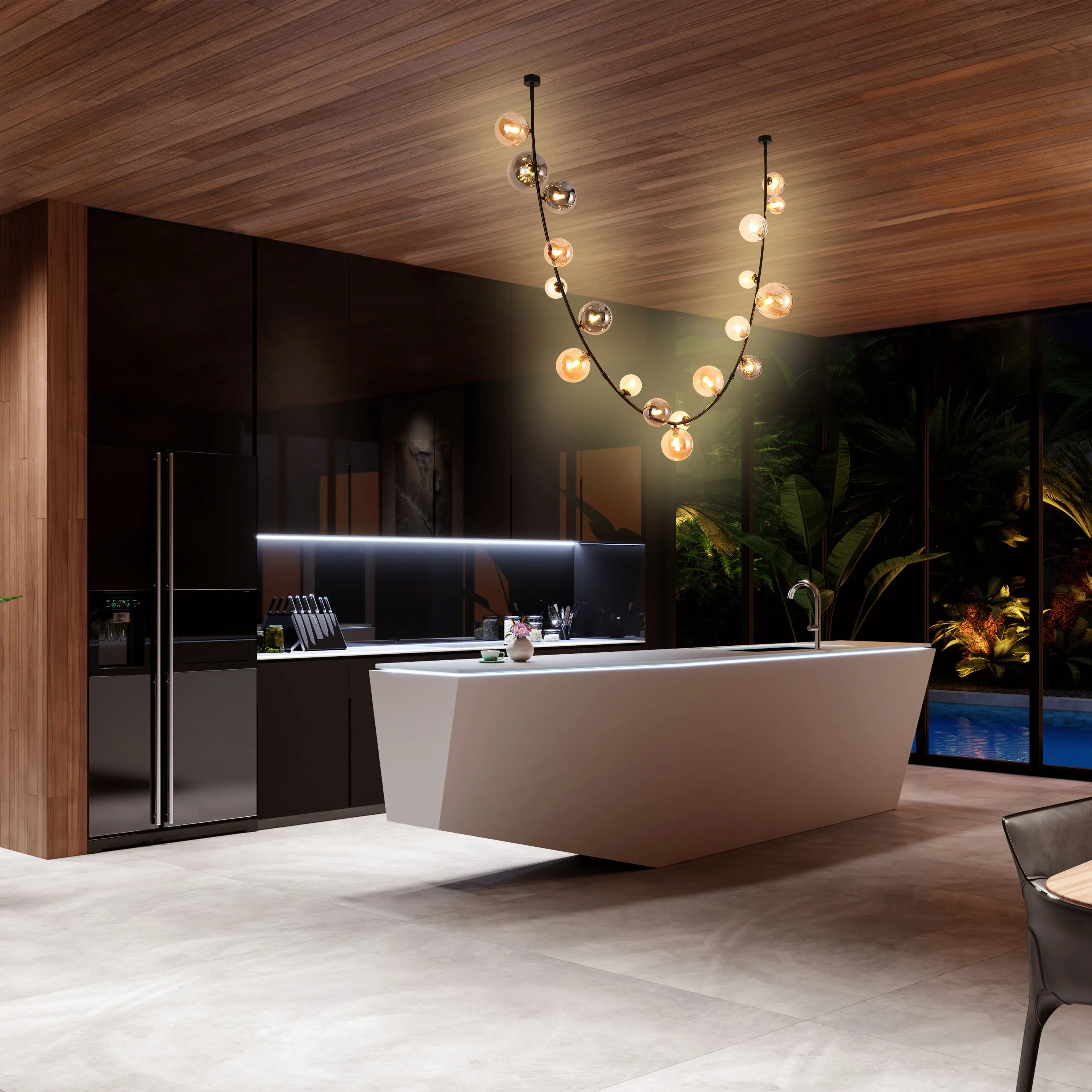 Striking, modern kitchen lighting. Features a unique, spherical chandelier that casts a warm glow, enhancing the room's luxurious feel.