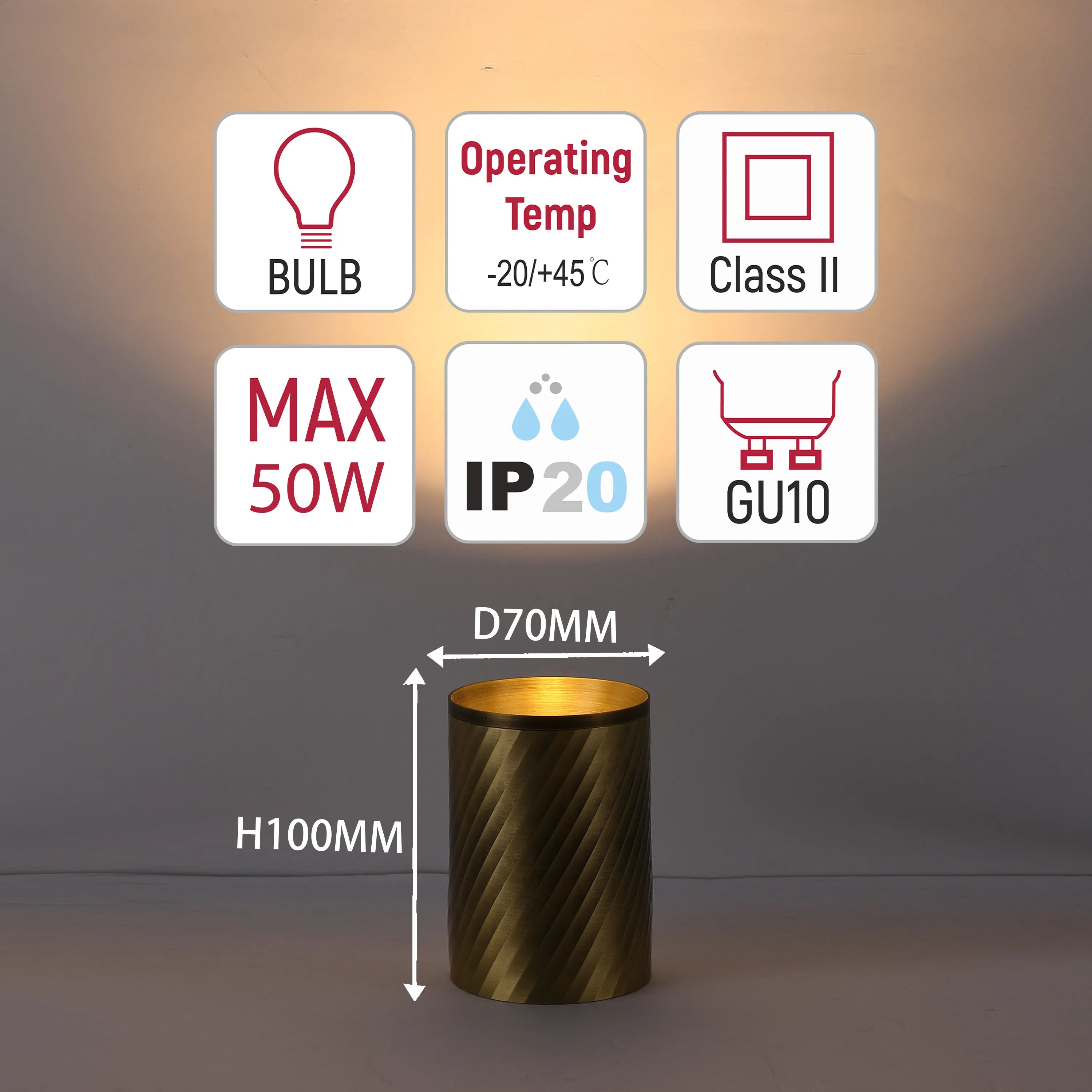 A metal gold coloured lamp with an illustration of the lamp's specifications, including bulb, max, operating temp, class II, IP20 and GU10.
