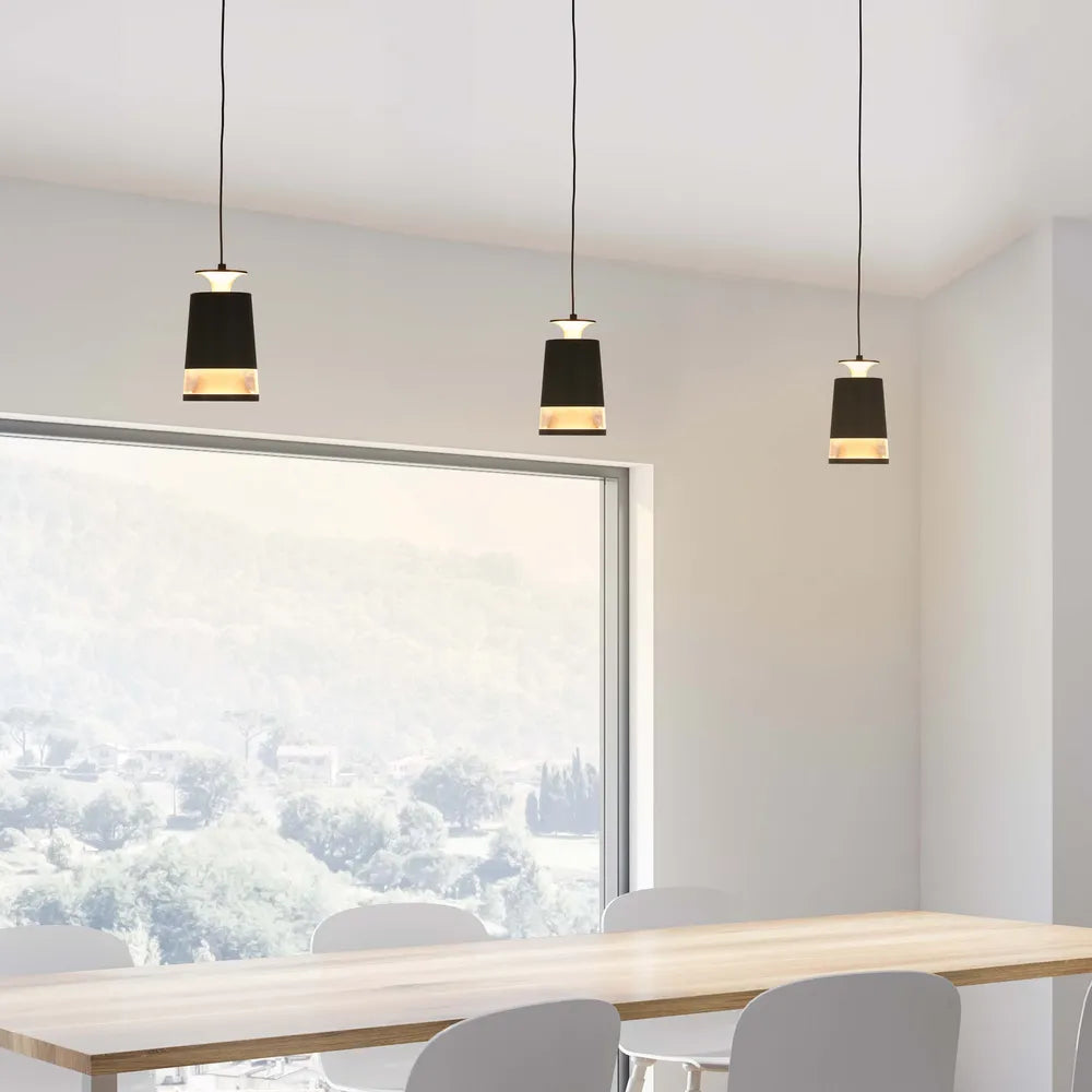 Sleek black pendant downlight illuminating a modern kitchen with warm white ambiance, enhancing stylish decor and contemporary aesthetics.150-19082