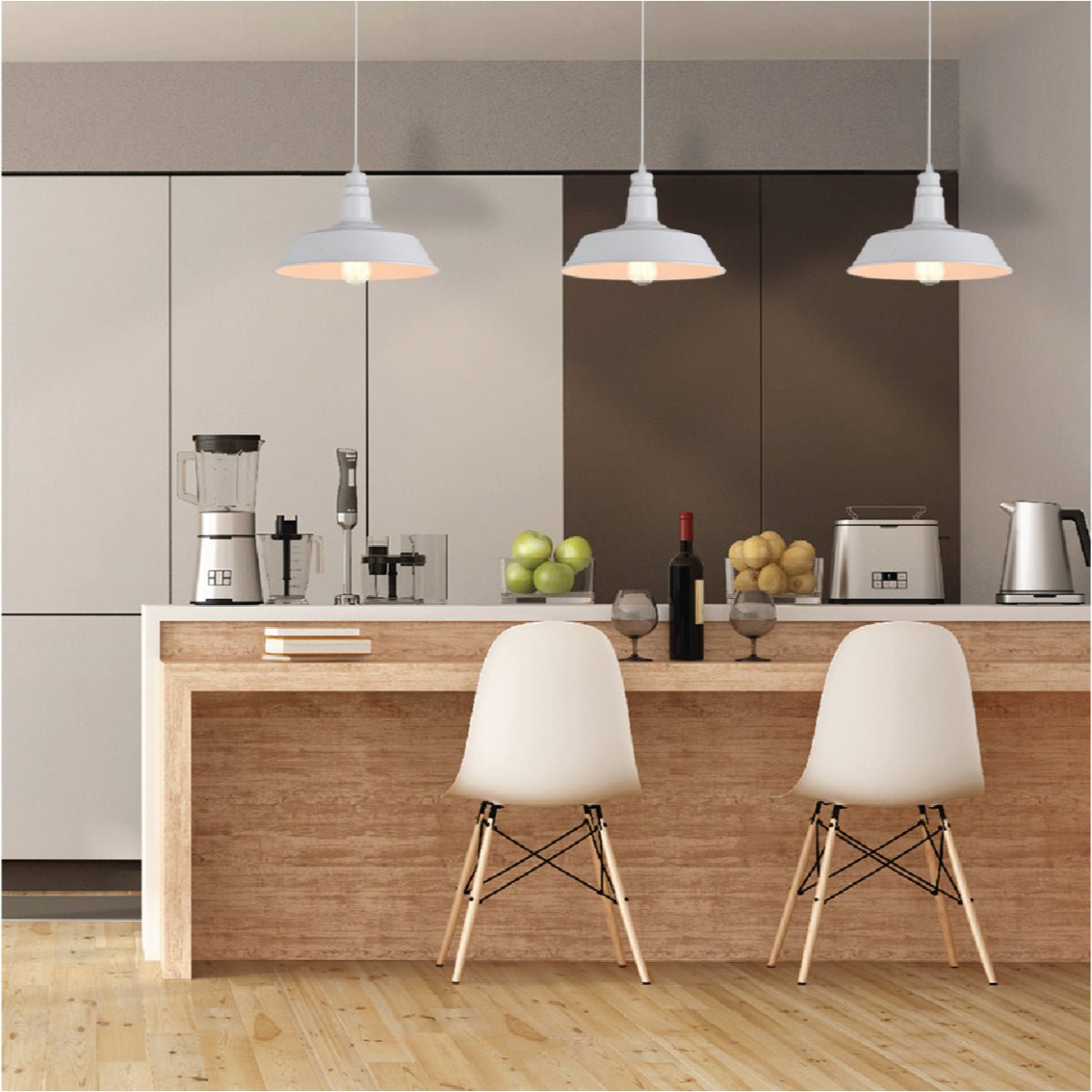 A modern kitchen island with two stylish white chairs underneath, illuminated by three pendant lights above.