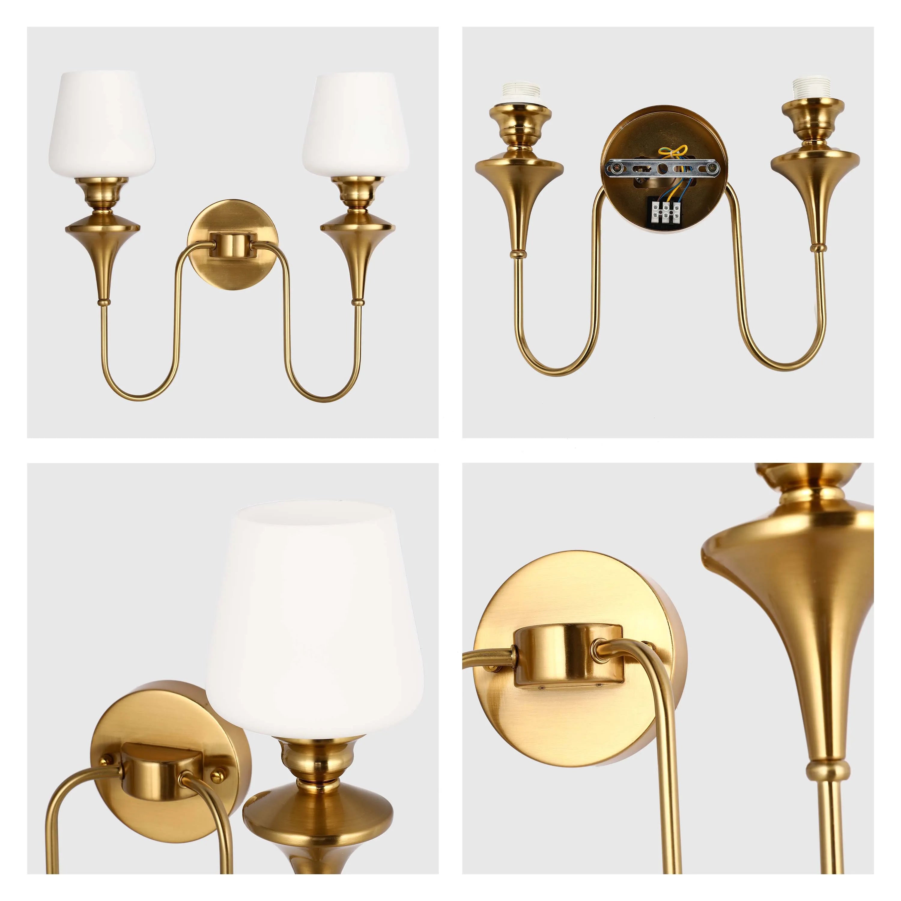 A gold finish, two-light wall sconce with white glass shades. A stylish addition for any room.